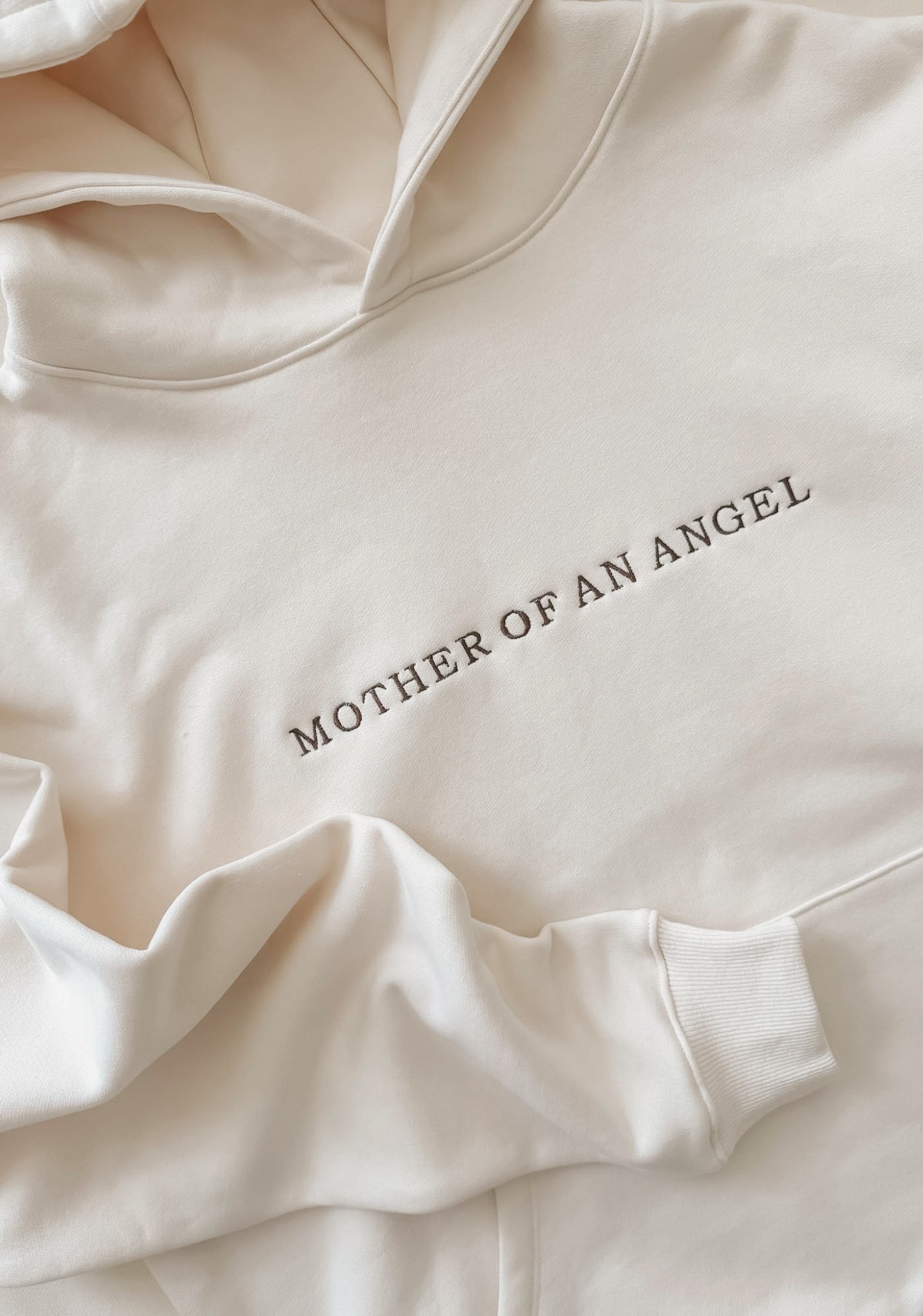 Mother Of An Angel Comfort Hood in Créme